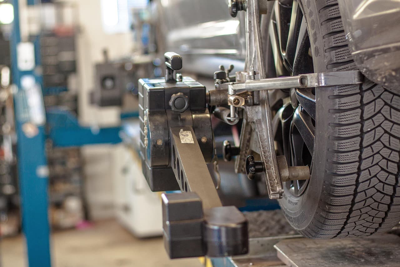 Car raised on a lift in the workshop